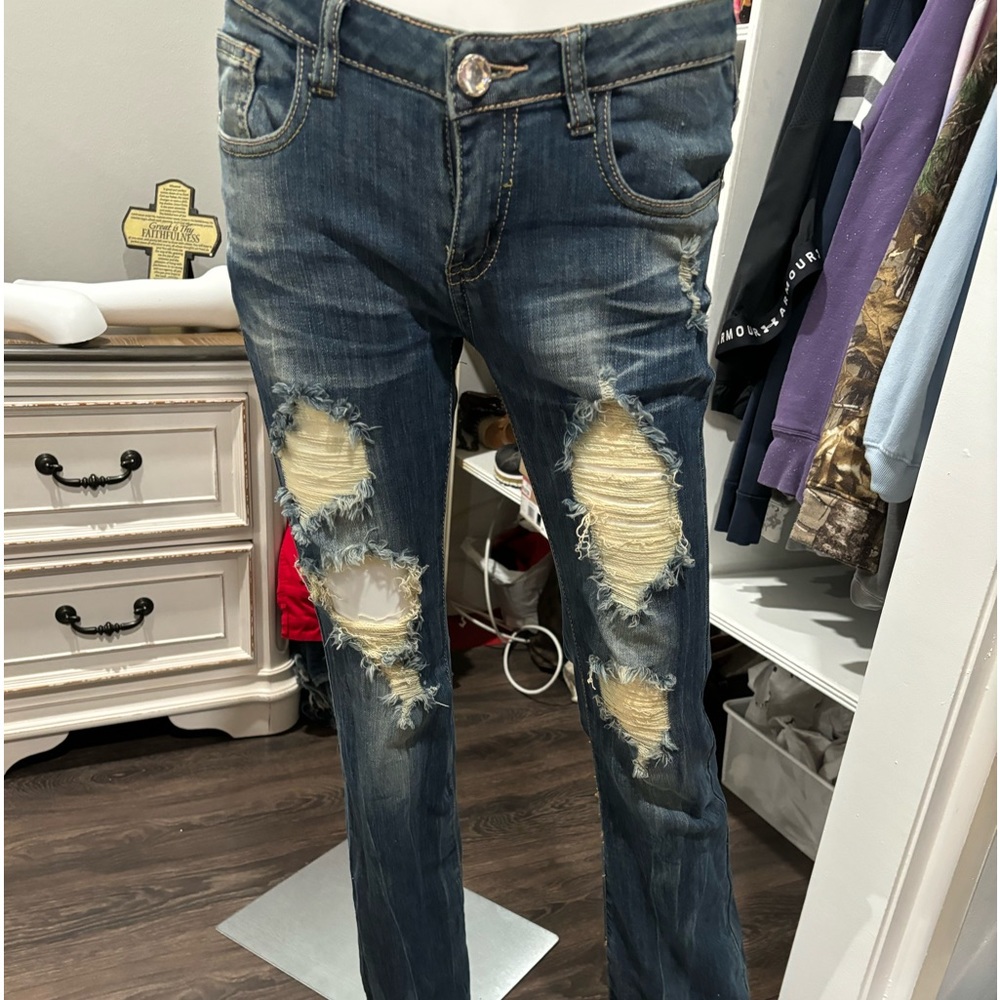 Ripped jeans never worn